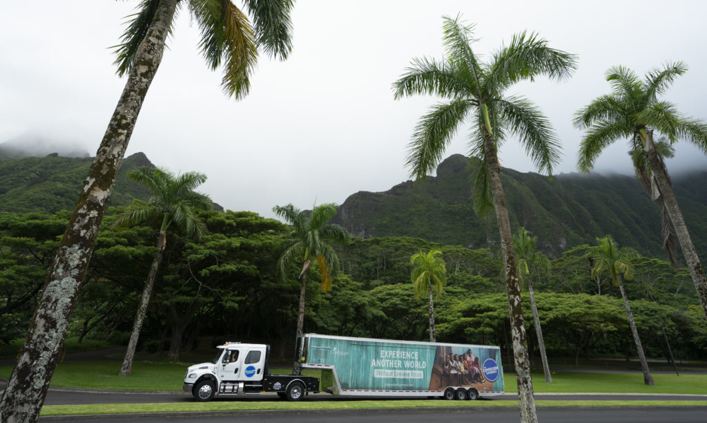 A trailer driving on the road