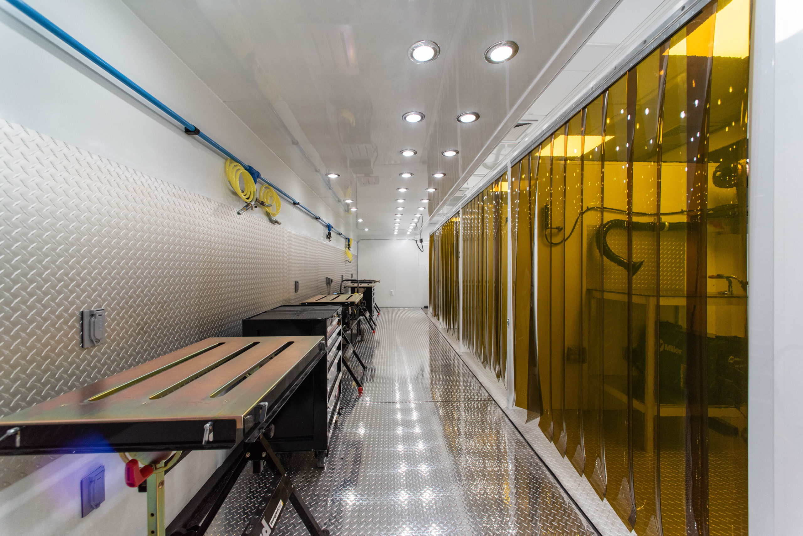 First Institute SS Rear to Front Welding Booths with Curtains Closed