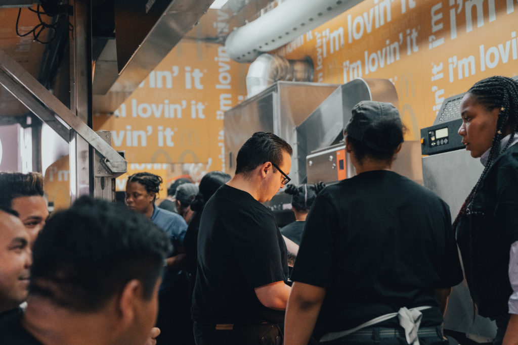 Kitchen crew in a mobile Mc Donald's kitchen