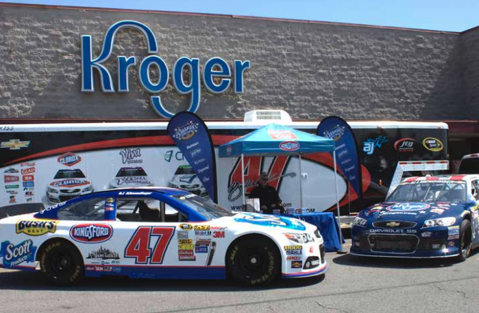Tents and marketing displays in front of Kroger